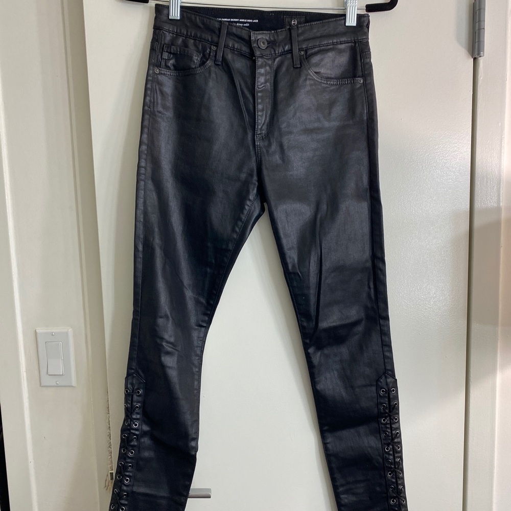High waisted skinny black leather lace up jeans